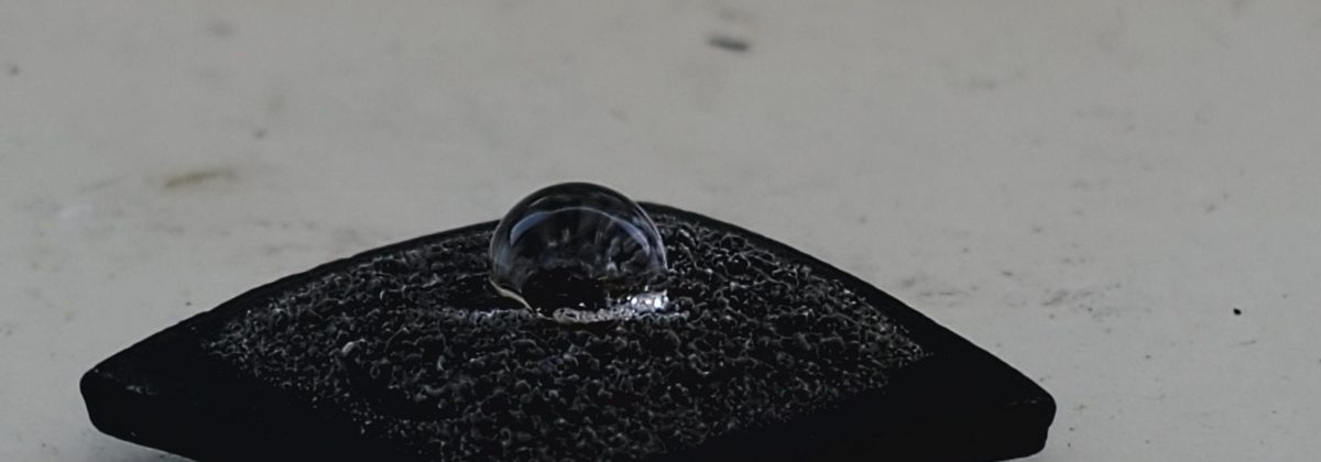 contact angle on a passing through grew rubber